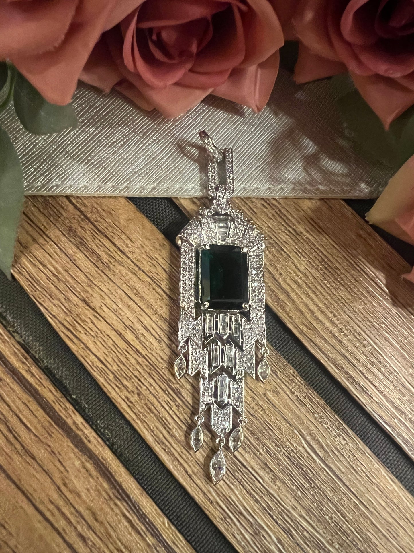 Long emerald pendant