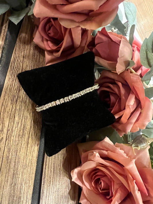 Round stone tennis bracelet